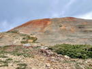 A massive red peak laden with iron ore