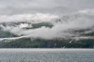 Cloud shrouds and water falls