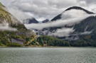 In the distance the edge of a glacier coming over a high ridge