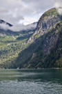 Cloud shrouding the top of a valley  with massive granite cliffs to the right