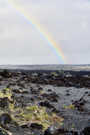 Rainbow over lava flow