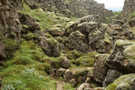 The trail requires scrambling over and around large boulders