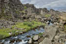 Looking back up at the stream tumbling over stone near the waterfall