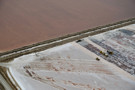 Dried out salt pond being mined