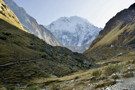 Several huts for hikers on the right, Salkantay straight ahead