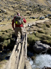 Crossing a stream in an open area on the way