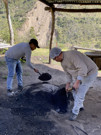 Final covering consists of dirt piled on top of the covering