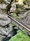 The trail crosses over and follows along the gorge
