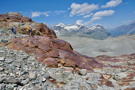 Climbing above the first lake, the stone formation is a rich red coloration