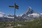 Trail sign with Matterhorn behind it